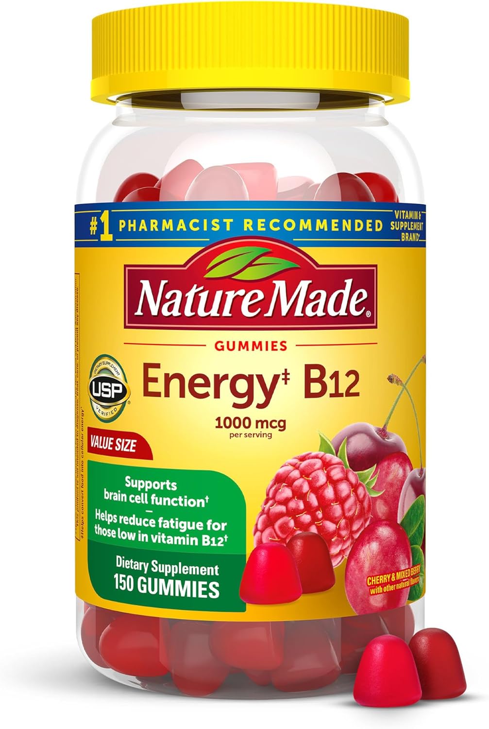 Close‑up of Nature Made B12 Gummies bottle on a kitchen counter, showing two gummies being held between fingers